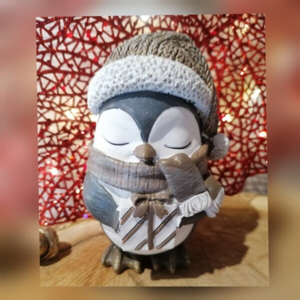 Pinguin grau braun