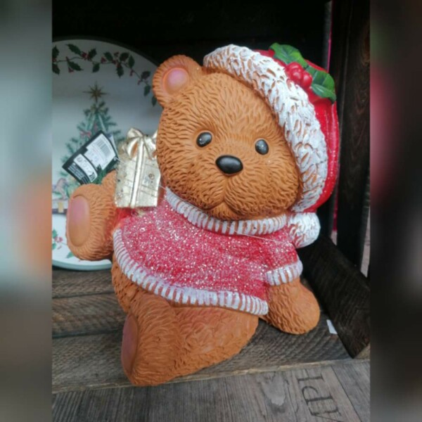 sitzend mit Geschenk